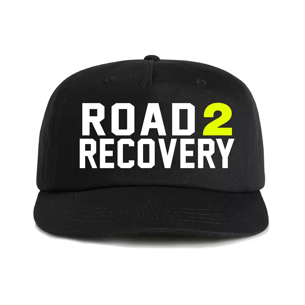 Front of hat that says Road 2 Recovery